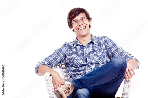 Laughing man on chair