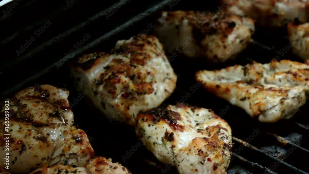 High quality video of cooking poultry on the grill in real 1080p slow motion 120fps High quality video of cooking poultry on the grill in real 1080p slow motion 120fps