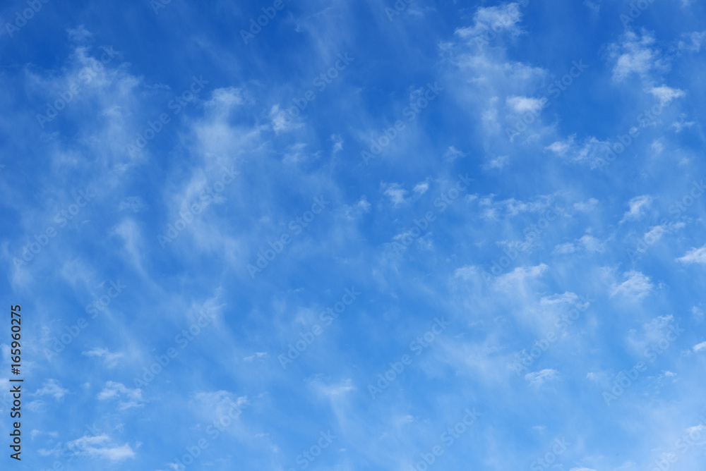 Blue beautiful sky with snow-white clouds of different shapes, background Blue beautiful sky with snow-white clouds of different shapes, background