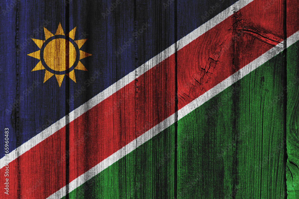 Namibia flag painted on wooden wall for background Namibia flag painted on wooden wall for background