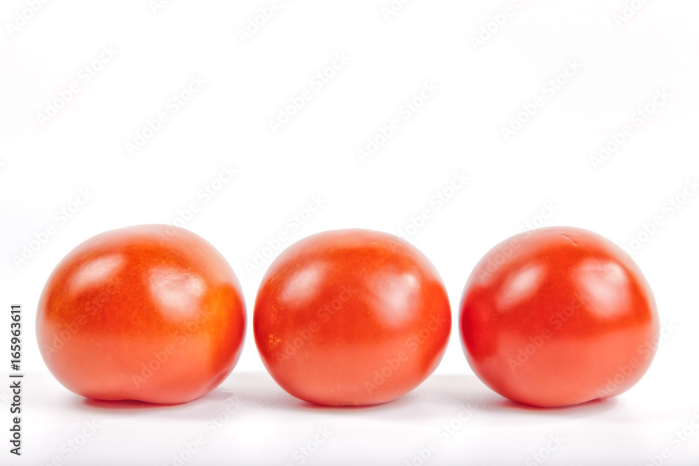 Tomatoes on white background. Tomatoes on white background.