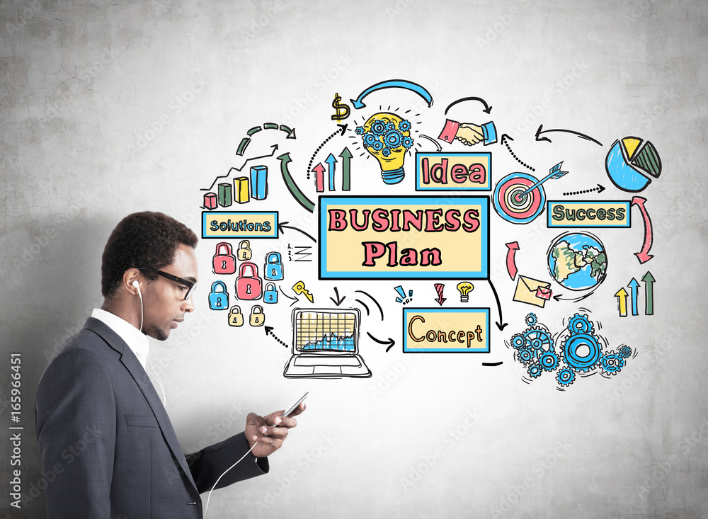 African man with a smartphone, business plan African man with a smartphone, business plan