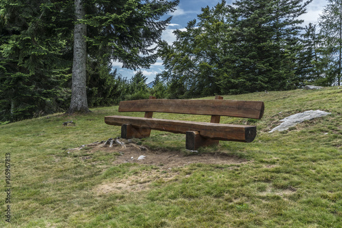 Wooden bench in high mountain