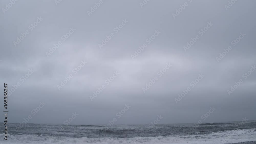 Cloudy shoreline, wide shot Cloudy shoreline, wide shot