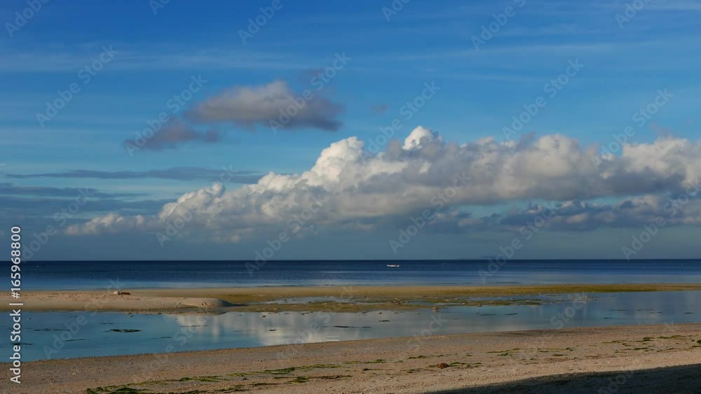 A bright clip from Siquijor white sand beaches. A vague silhouette of the Apo Island can be seen in the horizon. Presented in real time. A bright clip from Siquijor white sand beaches. A vague silhouette of the Apo Island can be seen in the horizon. Presented in real time.