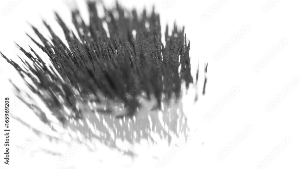 Grey magnetic sand moves around, macro close up Grey magnetic sand moves around, macro close up