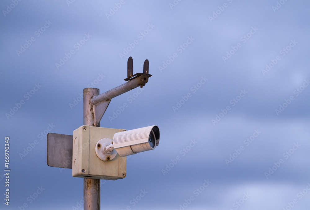 Old cctv with blue sky background
