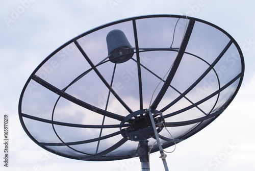 Satellite dish transmission data with blue sky background