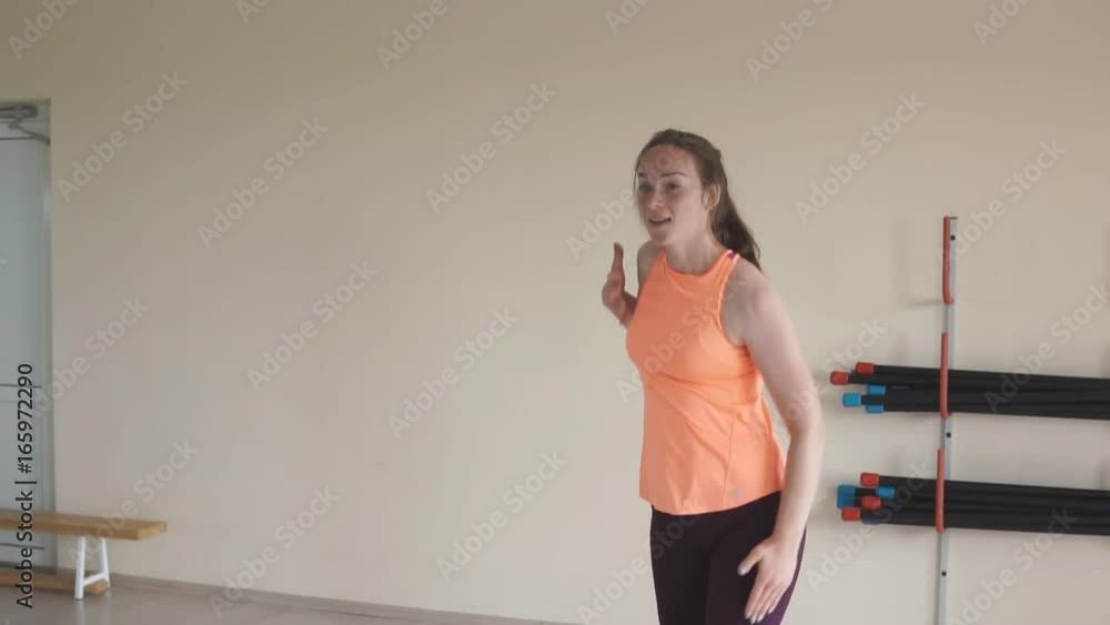 Young pretty girl mix dancing in studio. slow motion. Young pretty girl mix dancing in studio. slow motion.