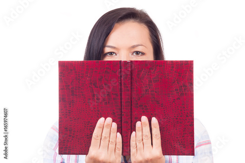 Beautiful Young Woman Reading a Book and Hides His Face © doomu
