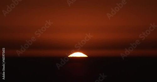 Timelapse, scenic sunset over horizon