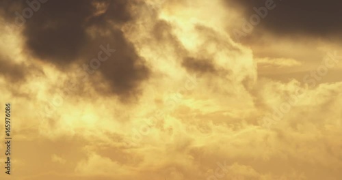 Timelapse, clouds pass over sunset
