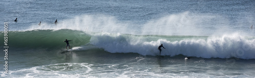 surfers catch big waves along the Queensland coast  Australia  at Surfers Paradise.