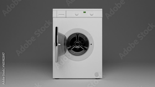 Domestic washing machine opening door ready to receive dirty clothes.