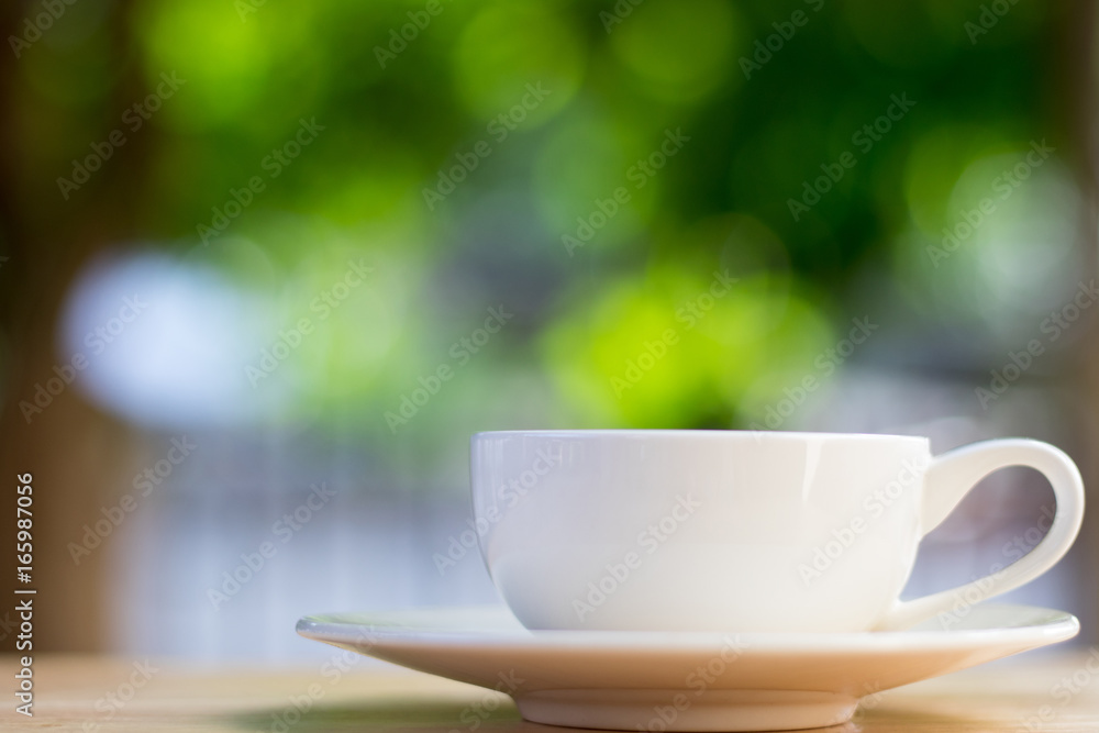 Coffee cup on bokeh background Coffee cup on bokeh background