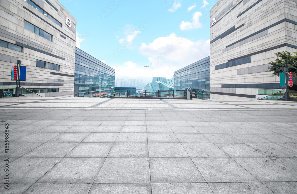 Fototapeta premium Empty floor with modern skyline and buildings