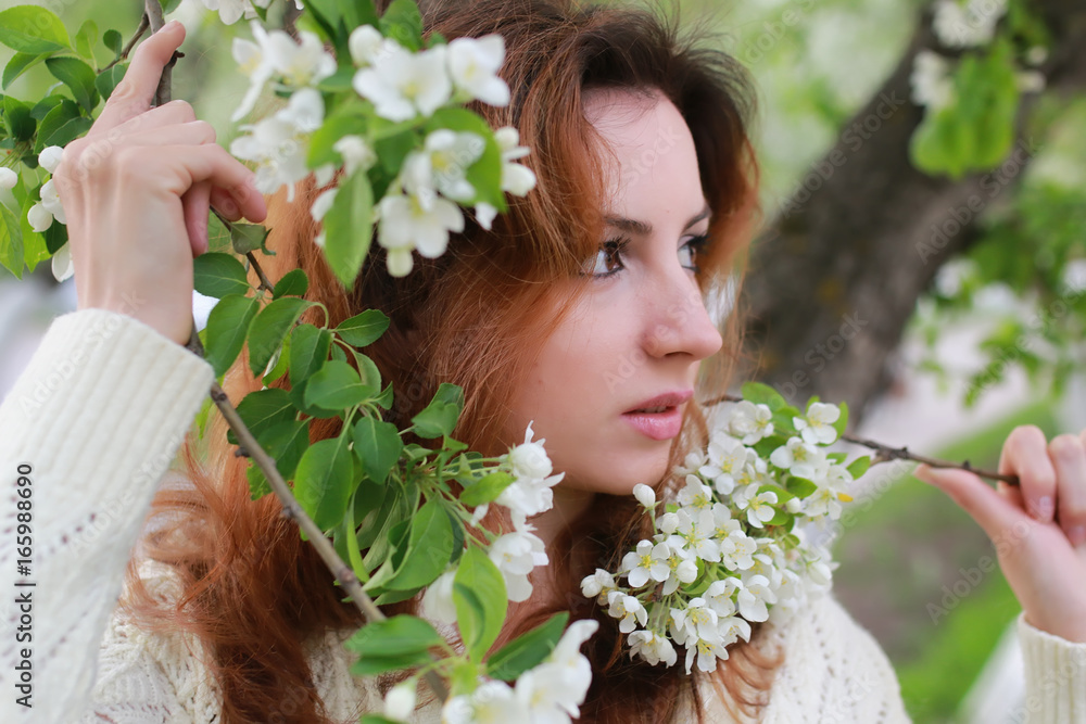 Naklejka premium women with branch apple flower