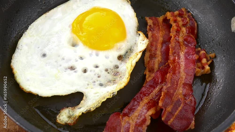 Fresh made Bacon with fried Eggs (not loopable; 4K) Fresh made Bacon with fried Eggs (not loopable; 4K)