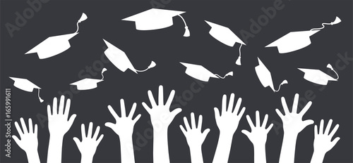 Hands of graduates throwing graduation hats in the air. Concept 