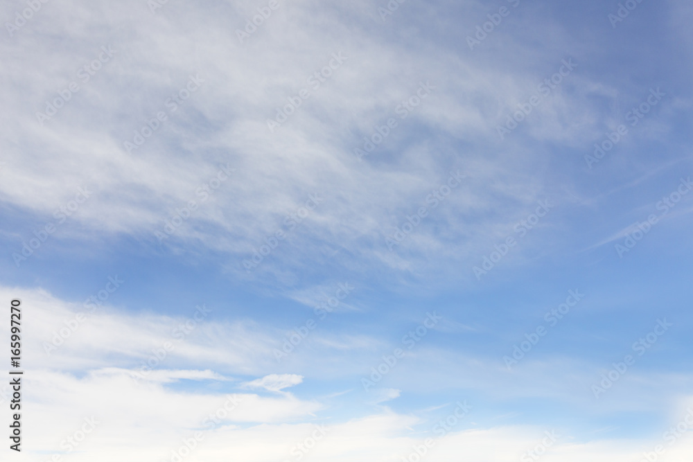 Fototapeta premium the sky when i am looking through window aircraft during flight in wing with a blue sky.
