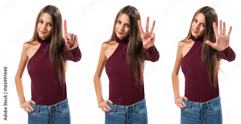 Young teenager girl counting three