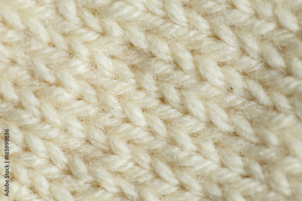A beautiful closeup of a hand knitted warm and soft wool pattern. Soft socks or scarf of natural wool. Colorful pattern. A beautiful closeup of a hand knitted warm and soft wool pattern. Soft socks or scarf of natural wool. Colorful pattern.