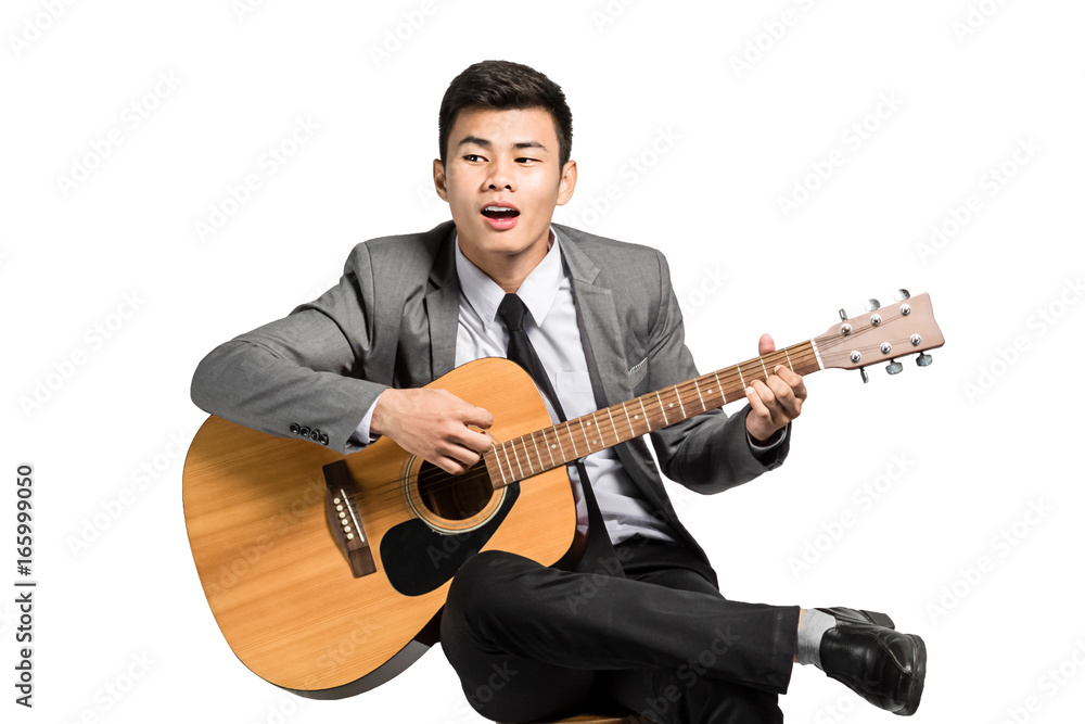 Portrait of a young asian businessman with guitar. Isolated on white background with clipping path
