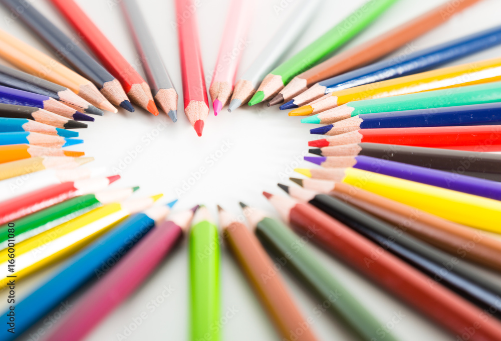 colored pencils lying around the heart