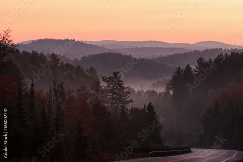 Early foggy morning in the autumn Algonquin Park in Canada photo