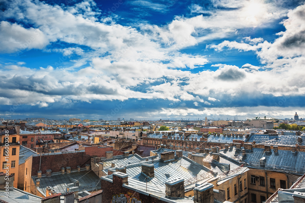 Saint Petersburg panorama, view from roof in the center of old city or downtown, dramatic sky, roofs of houses, horizon Saint Petersburg panorama, view from roof in the center of old city or downtown, dramatic sky, roofs of houses, horizon