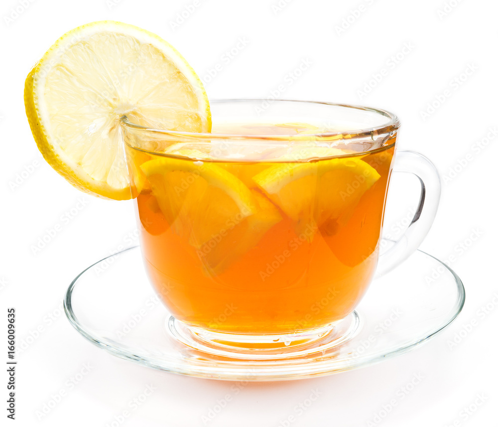 Isolated transparent cup of tea with lemon slice Isolated transparent cup of tea with lemon slice