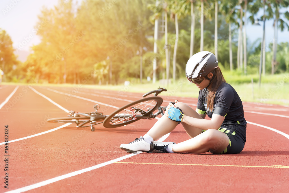 Naklejka premium Girl has sport accident injury from bicycle