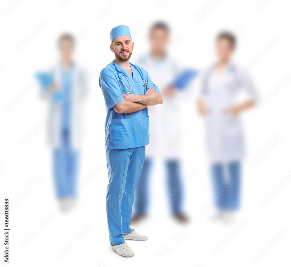 Fotografie Handsome young doctor on white background
