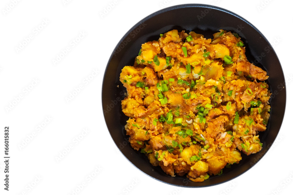 stewed meat with potatoes, onion in a frying pan. top view. isolated on white stewed meat with potatoes, onion in a frying pan. top view. isolated on white