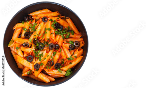 Penne pasta with tomato sauce in a frying pan. top view. isolated on white