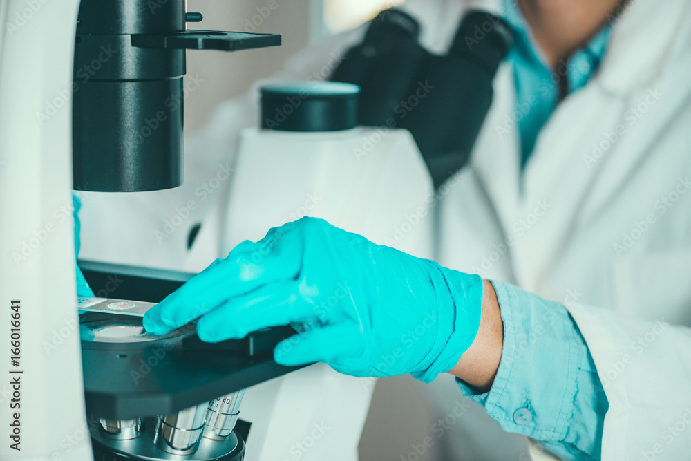 Scientist researching in laboratory Scientist researching in laboratory