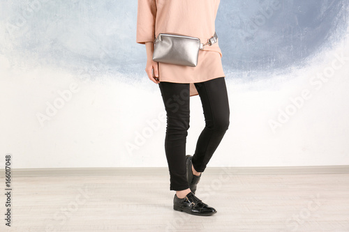 Young woman with leather ha...