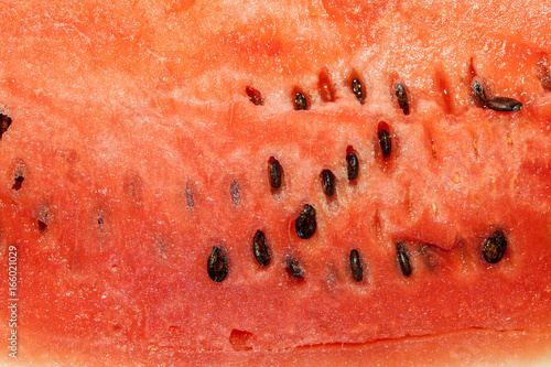 Texture of the pulp of watermelon with bones