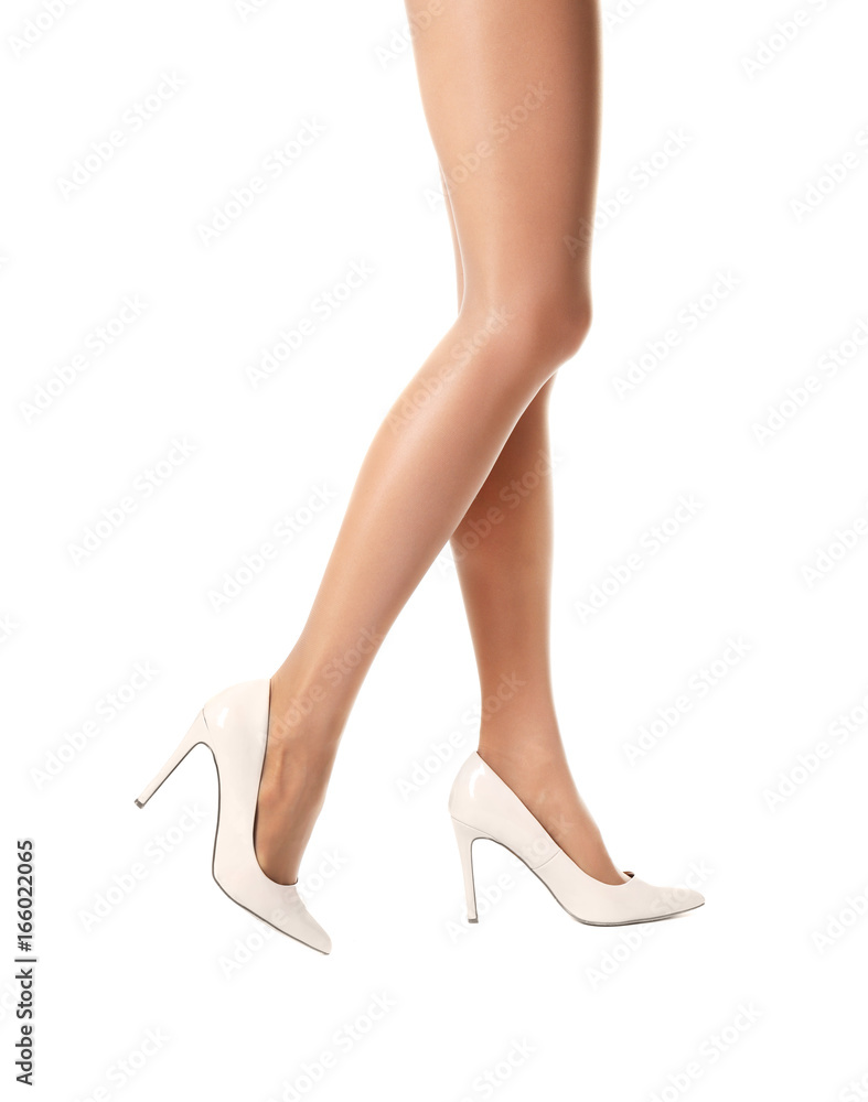 Legs of beautiful young woman in tights on white background Legs of beautiful young woman in tights on white background