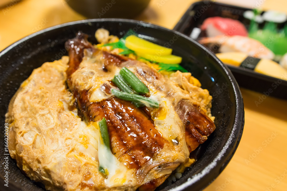 unagi donburi or eel bowl with rice and egg unagi donburi or eel bowl with rice and egg