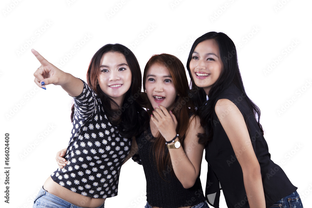 Pretty girls look something in studio Pretty girls look something in studio