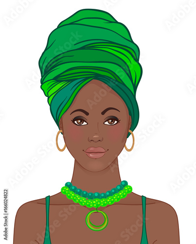 Portrait of beautiful African woman in turban. Tribal style fashion.