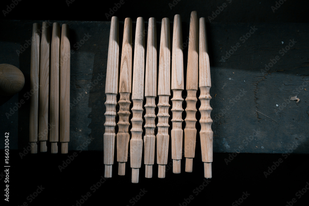 Wooden fragment ornament for shisha decoration on a wooden background. Wooden fragment ornament for shisha decoration on a wooden background.