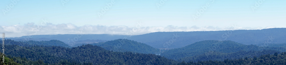 Wide panorama overlooking Loch Lomond in Northern California forested mountains