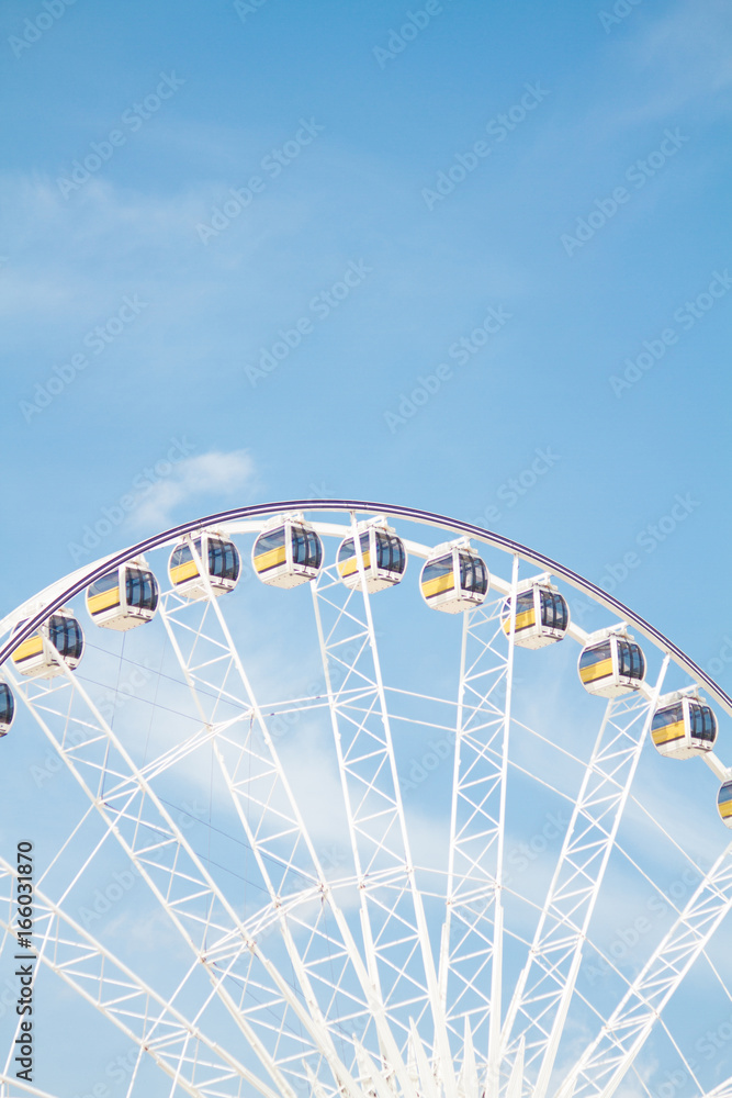 Ferris wheel with beauty blue sky.