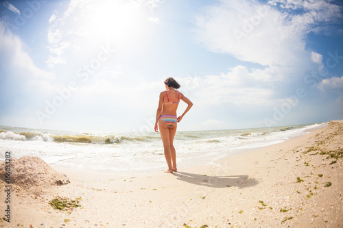 girl comes into the ocean