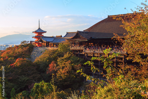 Kiyomizu-dera temple at sunset against blue sky background, Kyoto, Japan
