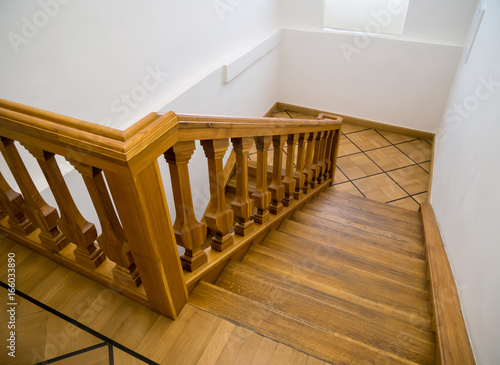 Old wooden staircase with steps going down
