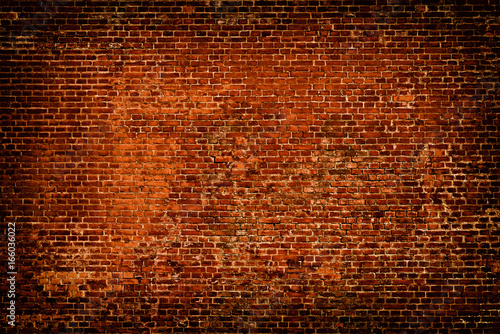 Ściana z cegieł czerwonego koloru tło