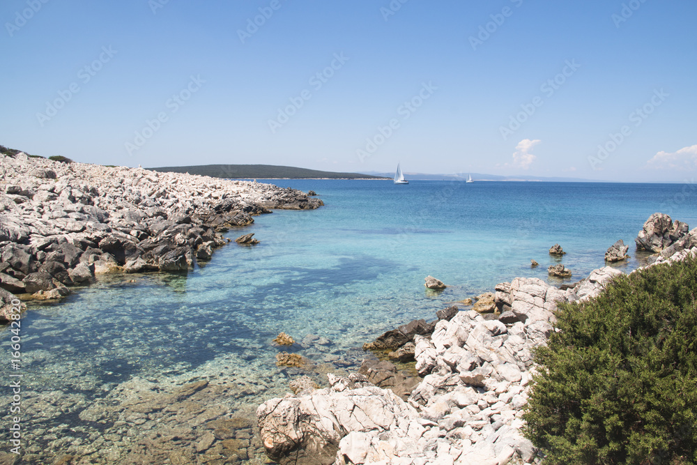 Coast with the turquoise water of the Adriatic sea on Cres island in Croatia
